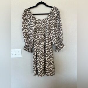 Portia Paisley Ruffle Trim Mini Dress by the brand CAARA